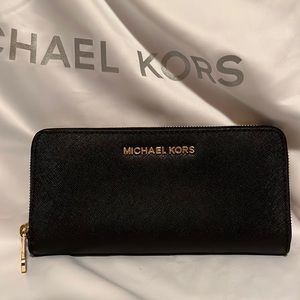 Michael Kors leather wallet.